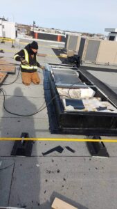 Silverback Torch On Systems Ltd. arrival at commercial project site with equipment ready for flat roof replacement job